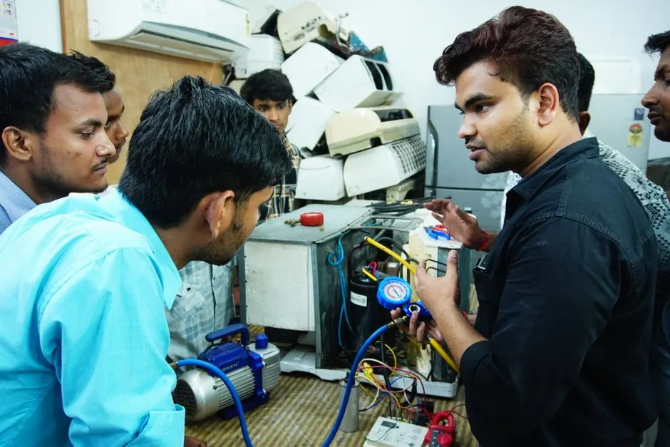 Faiyz Maintenance technician performing commercial AC repair in Madinah